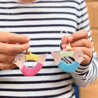 
              Make Your Own Pastel Flying Bird Decorations
            