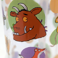 Cartoon character with a brown face and horns on a colorful background