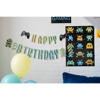 
              Level Up "BIRTHDAY" Banner with Silver Accents Hung at Party
            