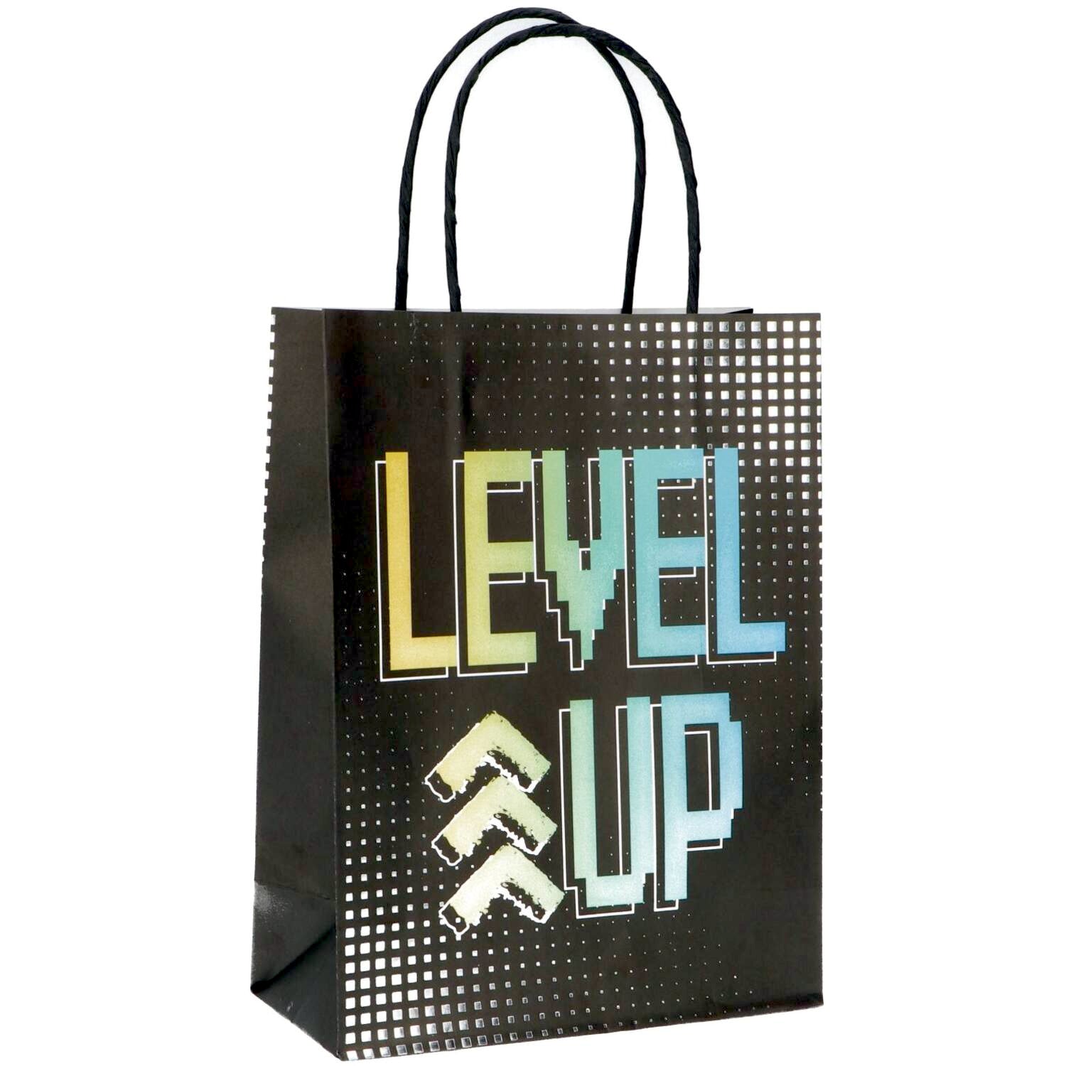 Detailed View of Level Up Gift Bag with Gaming Terms and Name Tag