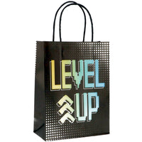 
              Detailed View of Level Up Gift Bag with Gaming Terms and Name Tag
            