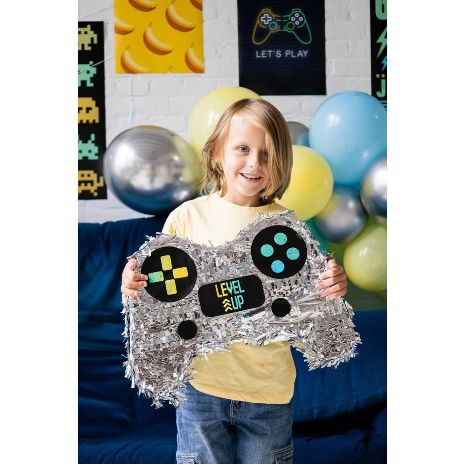 Packaged Level Up Piñata flat in box with foil decoration detail