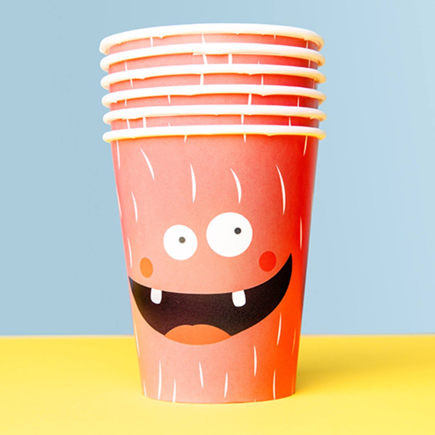 Monster Bash Paper Cups Displayed on Party Table for Kids