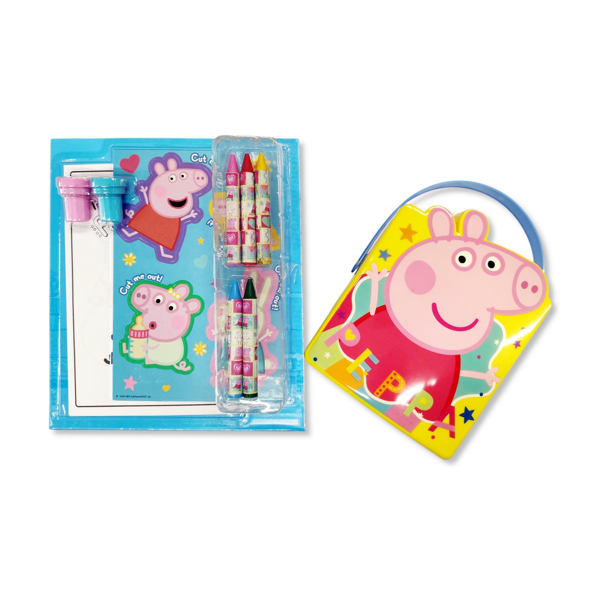Close-up of Peppa Pig craft supplies including crayons, stickers, stamps and sheets